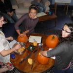 
Youth carving pumpkins